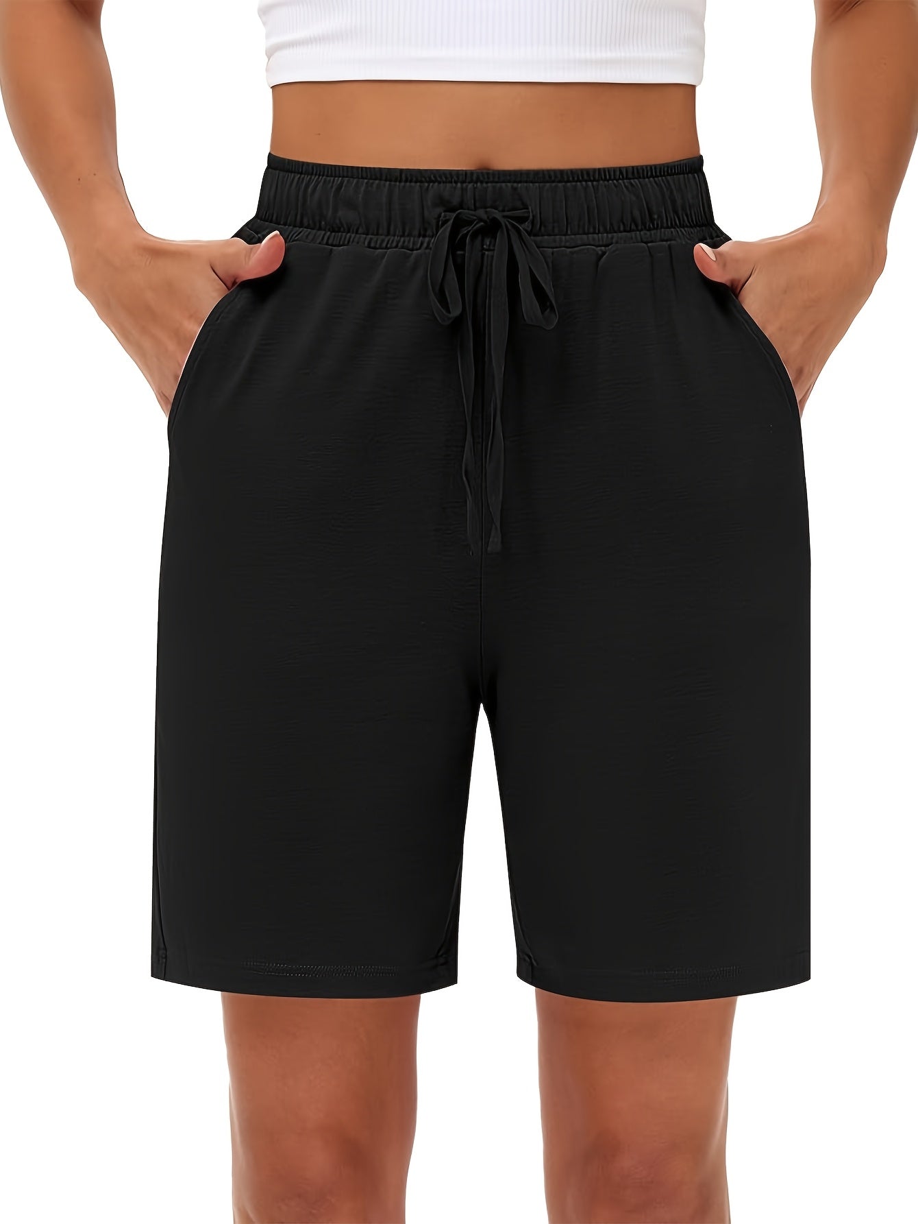 Plus Size Women's Moisture-Wicking Knee-Length Shorts with Pockets for Jogging and Casual Wear