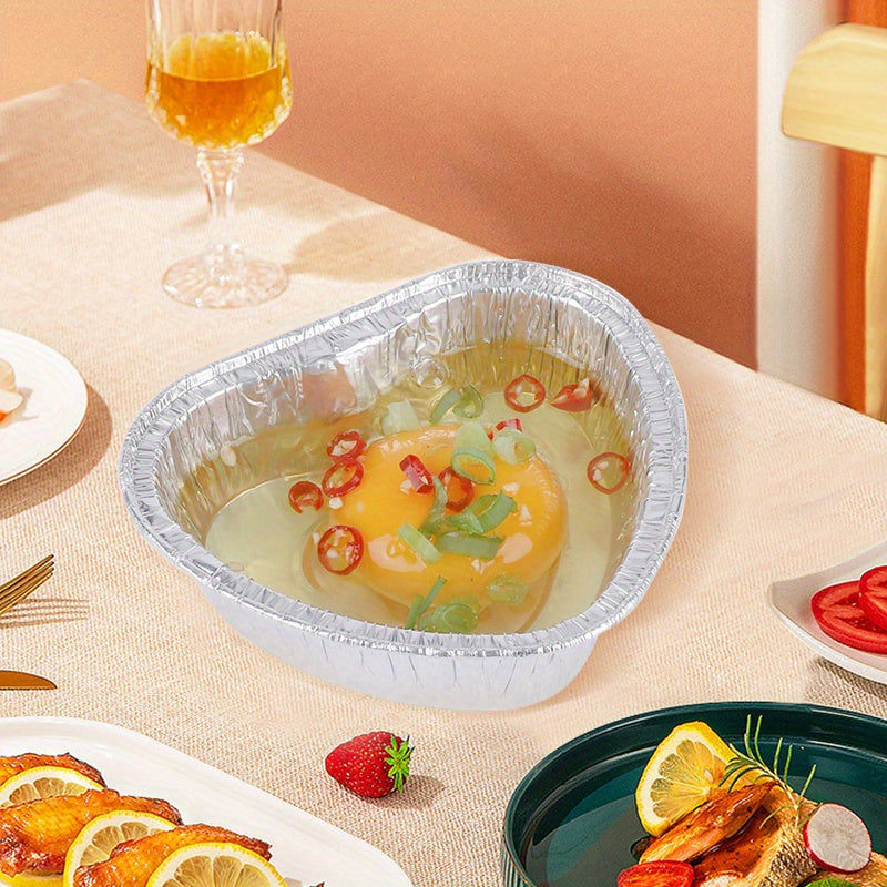 Yil boshidagi mavzuda yurak shaklidagi katta varaq idishlar, alyuminiy folgadan tayyorlangan, mikroto'lqinli pechda ishlatish uchun xavfsiz, qo'rg'oshinsiz, isitish va bayram bezaklari uchun mukammal.