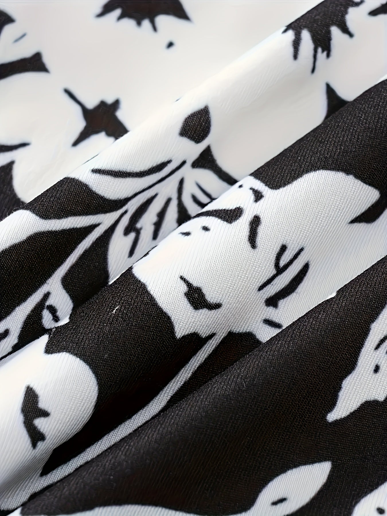 Top sin mangas casual de poliéster con cuello en V y estampado floral para tallas grandes de mujer