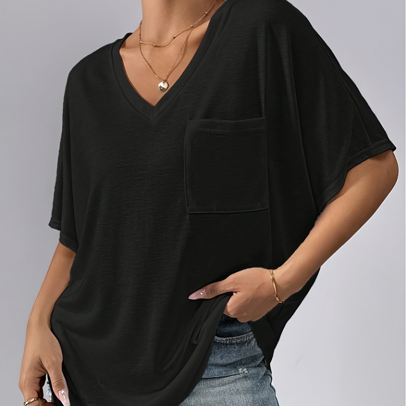 Camiseta de mujer blanca de manga corta con escote en V, casual y de corte suelto, top de verano