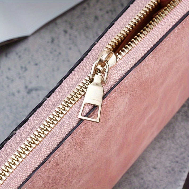 Cartera femenina de cuero sintético vegano negro con cierre de cremallera y correa de muñeca