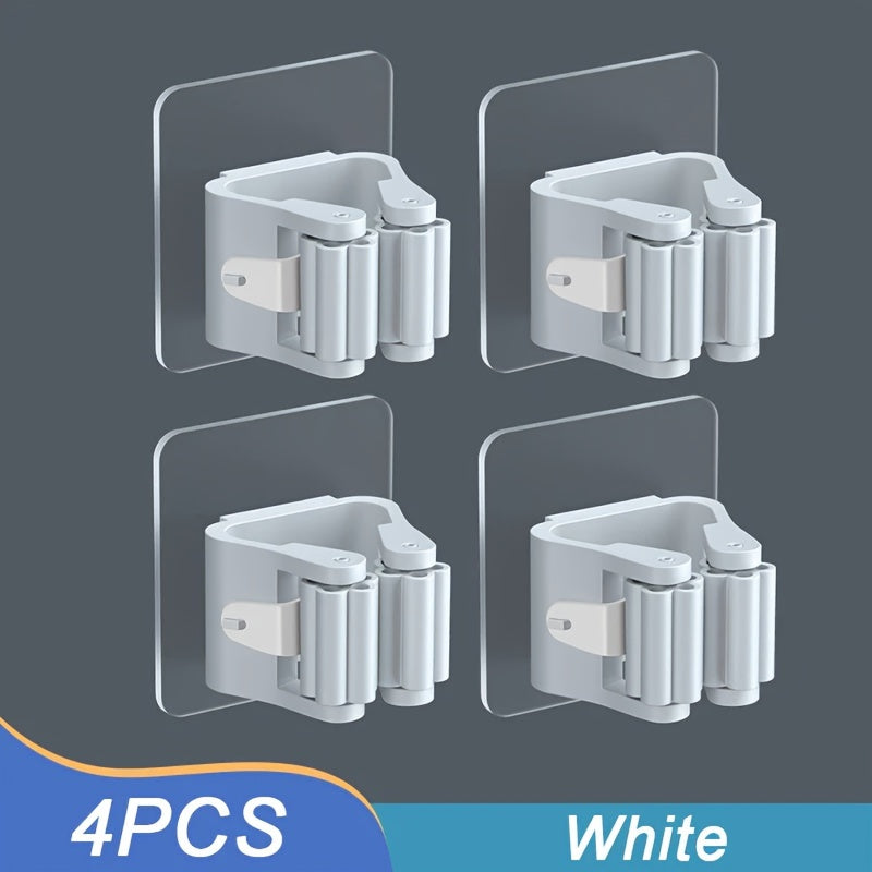 Soporte de pared blanco para trapeador y escoba con múltiples ganchos de plástico para almacenamiento en cocina y baño