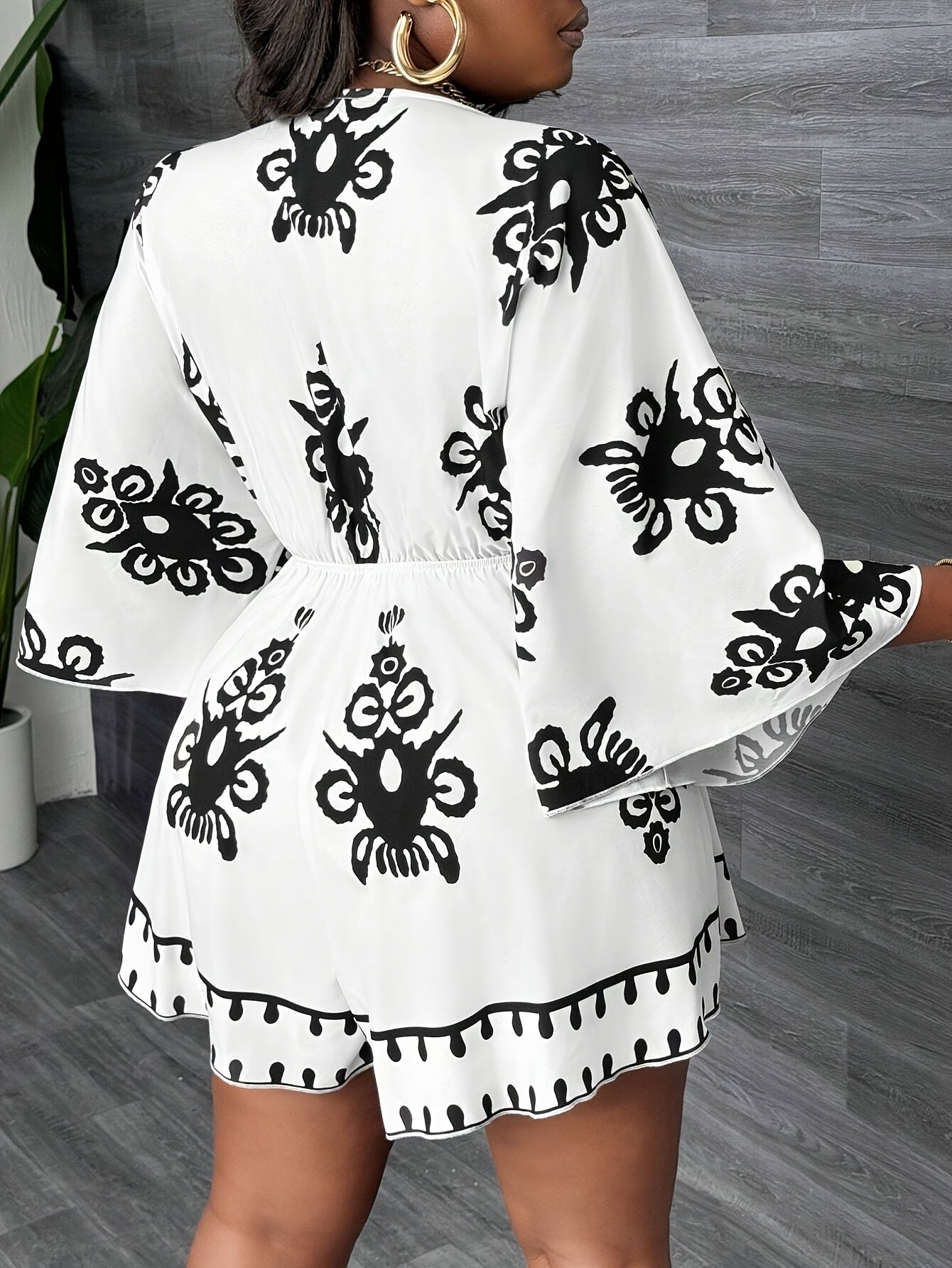 Plus Size Women's V-Neck Floral Romper with Tie Waist Black White Spring Summer