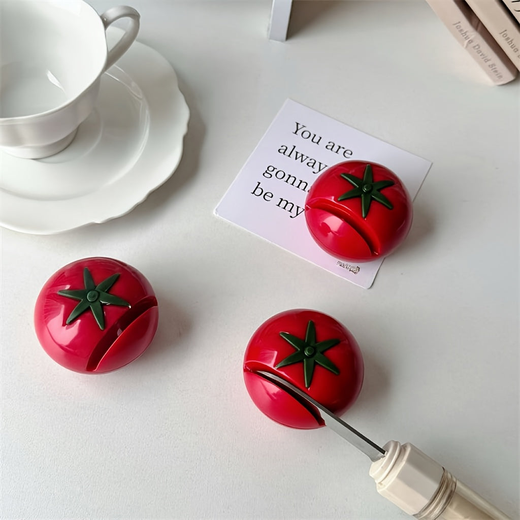 Pomidor shaklidagi pichoqni qirralash uchun; tez qirralash, portativ PVC asbob, qiziqarli dizaynga ega, batareyalar talab qilinmaydi.