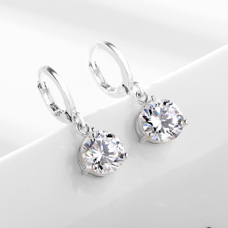 Kristal Zirconia pendanti, oq qotishmada rhinestone aksentlari bilan taqilgan marjon va bilaguzuklar to'plami, to'ylar va nikohlar uchun ideal, dumaloq shaklda, qizlar uchun mos.