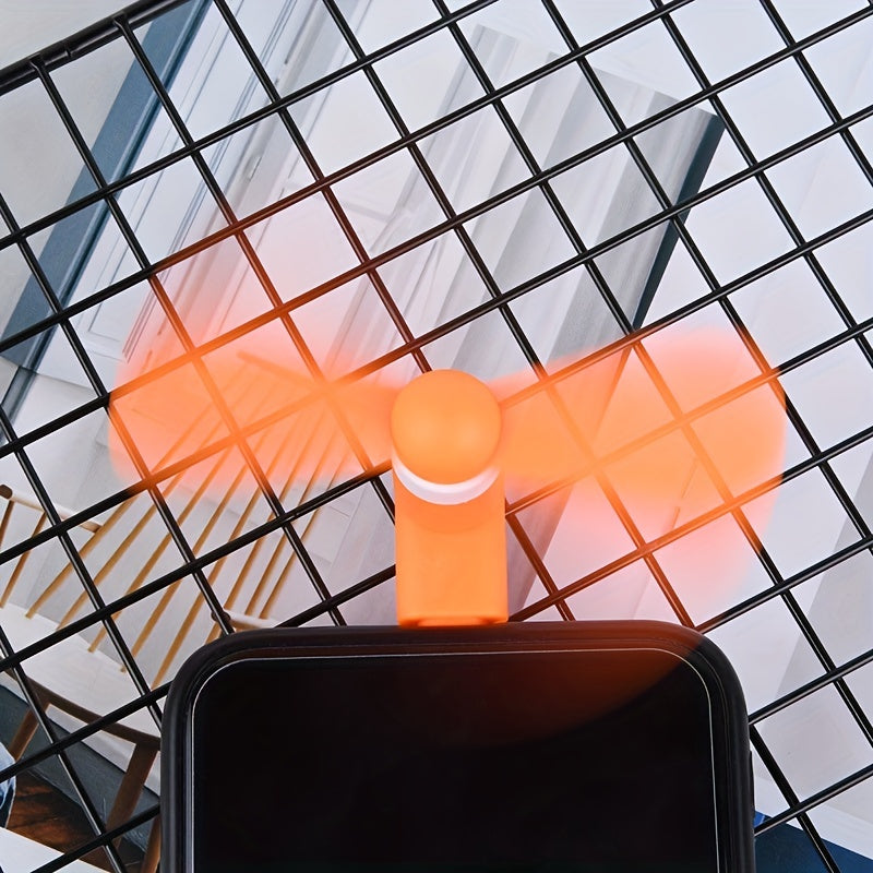 Android va Apple qurilmalari uchun uchta portativ mini telefon ventilyatori, USB quvvatlanadi va rang-barang. Yorqin ventilyator dizayni va sozlanadigan burchak bilan yozgi sovutish uchun ideal vosita. Telefon aksessuarlari.