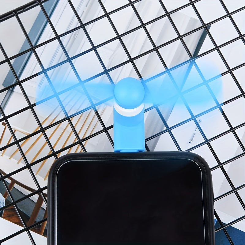 Android va Apple qurilmalari uchun portativ mini mobil telefon ventilyatori, rang-barang va sozlanadigan USB quvvati bilan, issiq havoda sovutish uchun ideal. Rangli dizayn bilan sozlanadigan ventilyator burchagi, mukammal