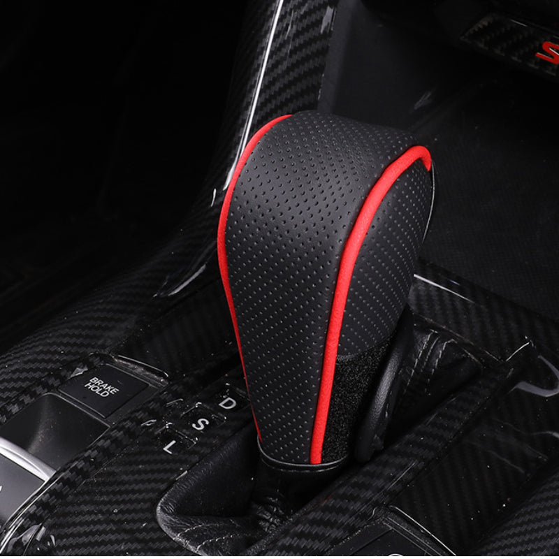 Universal PU teri avtomobil g'ildirakni uzatish uchun qopqog'i, qo'l tormozining yostiqchasi, avtomobil ichki bezaklari