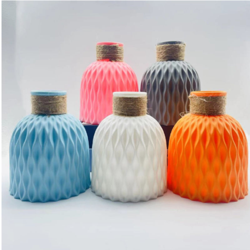 Sun'iy ananas naqshidagi gullar idishi uy uchun bezak.