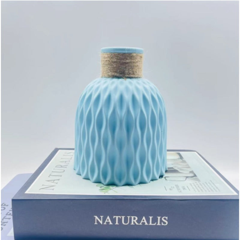 Sun'iy ananas naqshidagi gullar idishi uy uchun bezak.