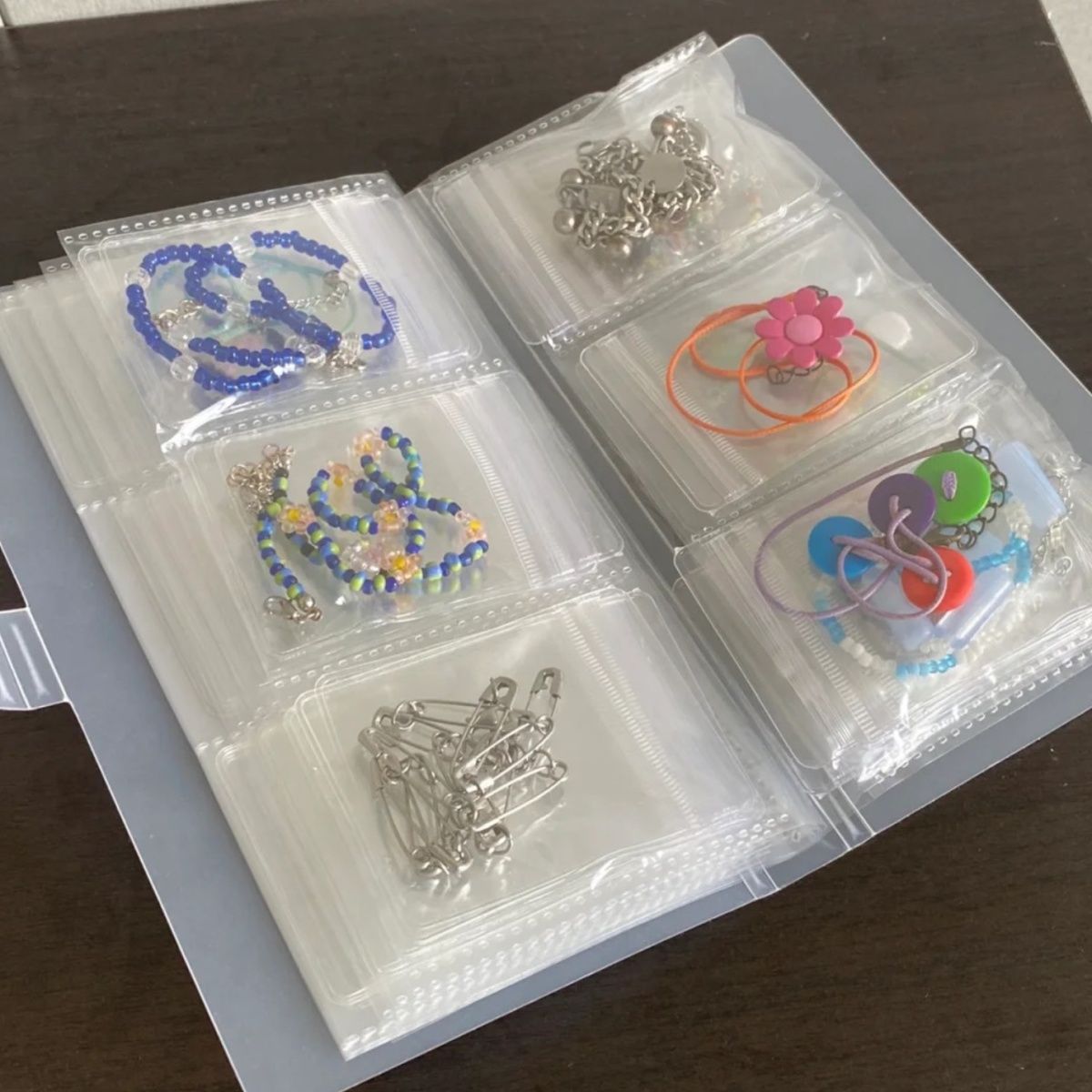 Libro organizador de joyas transparente con 84/160 cuadrículas para anillos, collares, pendientes y pulseras