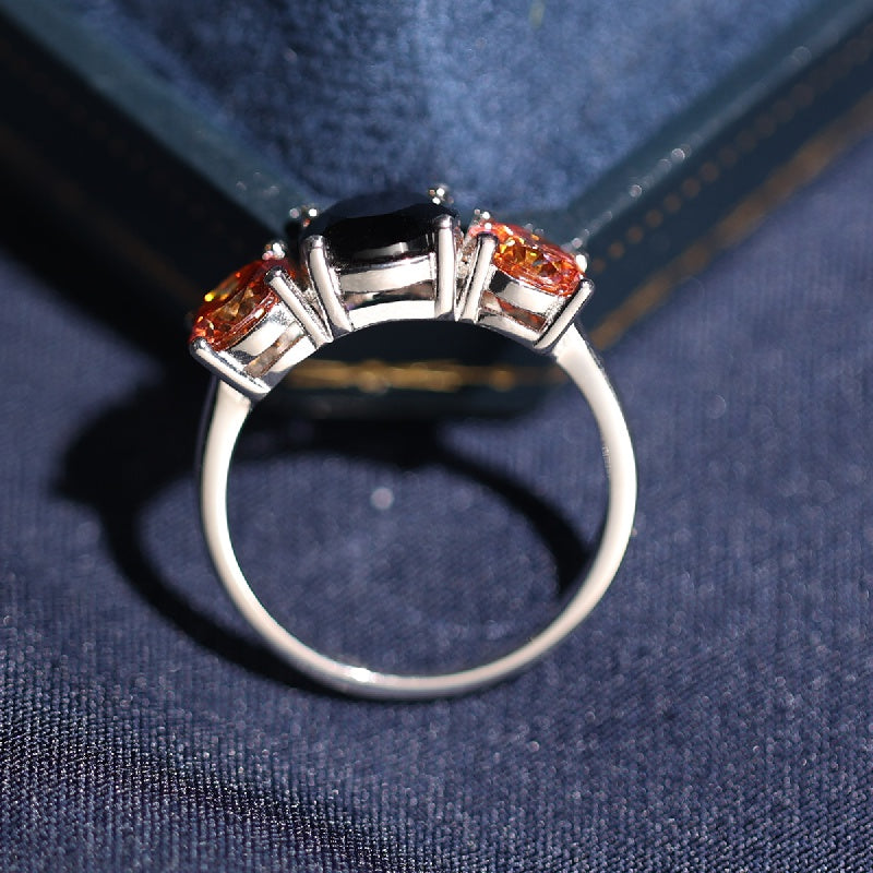 Sterling Silver Promise Ring Set with Orange Moissanite Stones and Black Moissanite Accent