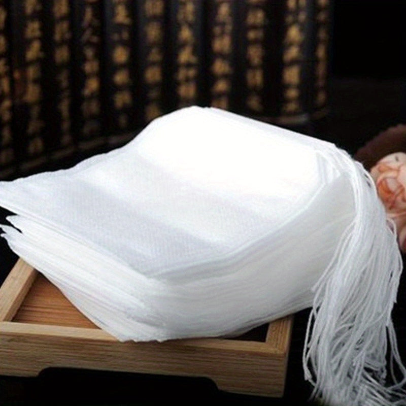 Set of 100 Disposable Tea Bags with Drawstring, Non-Woven Spice Filter Bags