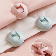 Ikki dona sirpanmaydigan yostiq tutgichlari - to'rtburchak tutqichlar, yotoq to'saklari va ko'rpa-to'saklarni mustahkam ushlab turish uchun. Ignasiz mahkamlagichlar turli ranglarda.