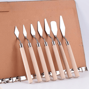 7-Piece Stainless Steel Cake Decorating Set with Fondant Spatulas and Scrapers