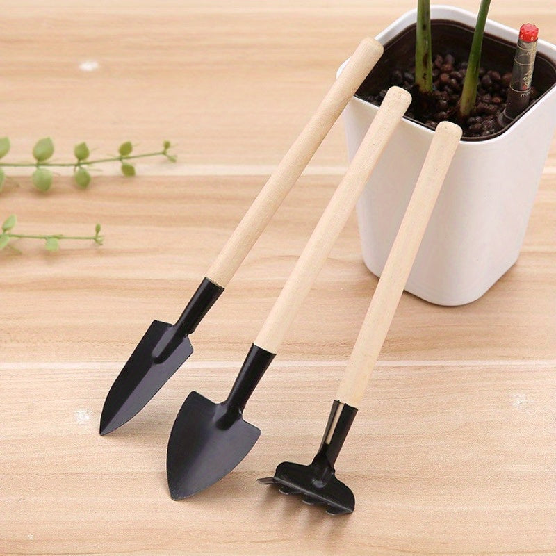 Set of Three Gardening Tools Including Flower Rake Small Shovel and Potted Supplies