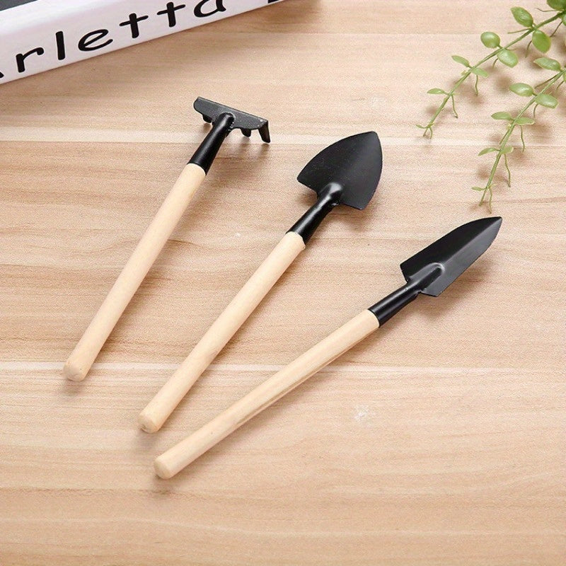 Set of Three Gardening Tools Including Flower Rake Small Shovel and Potted Supplies