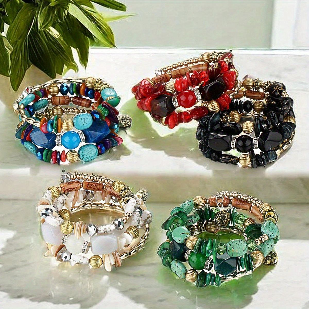 Yorqin rangli etnik ilhomlangan tabiiy toshdan yasalgan ko'p qatlamli bilaguzuk, erkaklar yoki ayollar uchun mukammal, tug'ilgan kunlar, maxsus tadbirlar yoki 14-fevral uchun ideal.