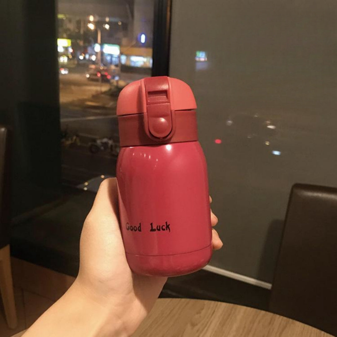 Botella de agua de acero inoxidable aislante con correa de transporte, taza de viaje a prueba de fugas