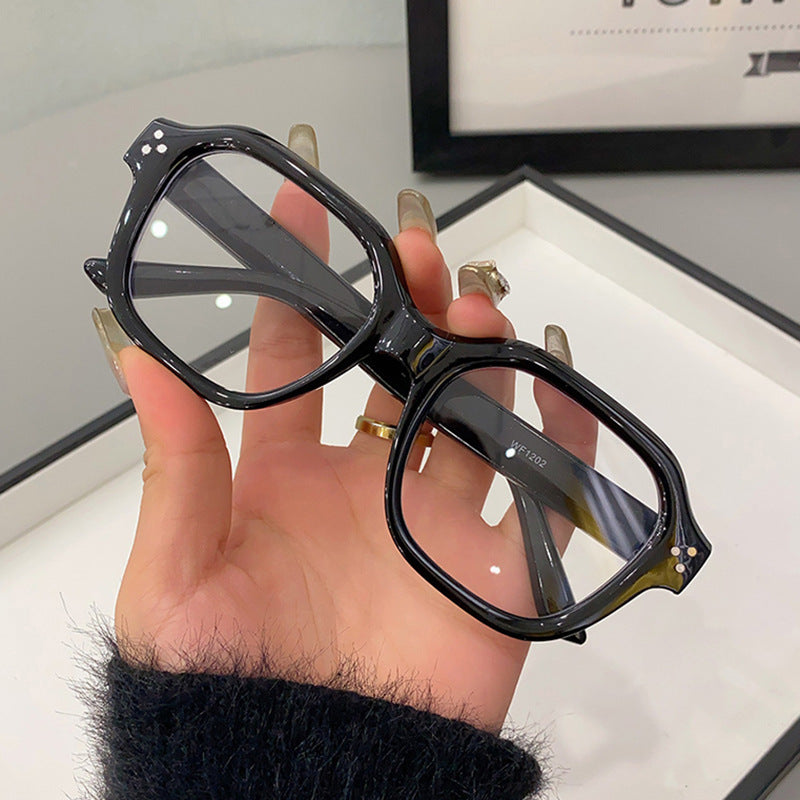 Gafas de estilo retro unisex con lentes transparentes y montura negra, gafas vintage