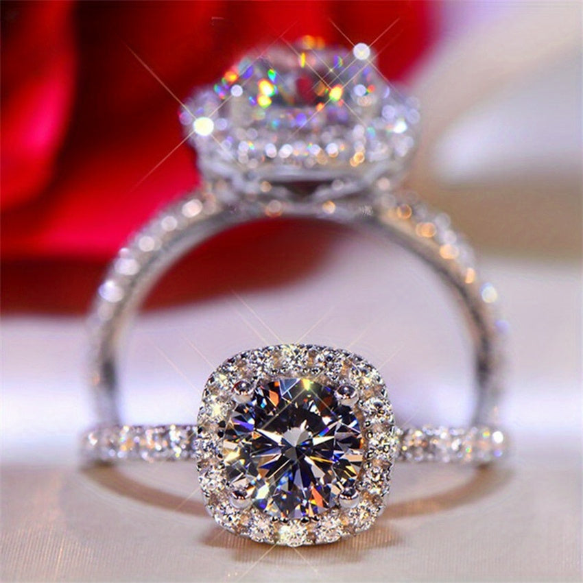 Ushbu nafis Vintage Luxury uzuk 18K oltin bilan qoplangan 925 kumush halqa va porloq 0.5-2CT Brilliant Round Cut Moissanite toshiga ega. Har kuni kiyish yoki musiqa festivallari uchun mukammal, bu yolg'iz uzuk 14-fevral kuni sovg'a berish uchun ideal.