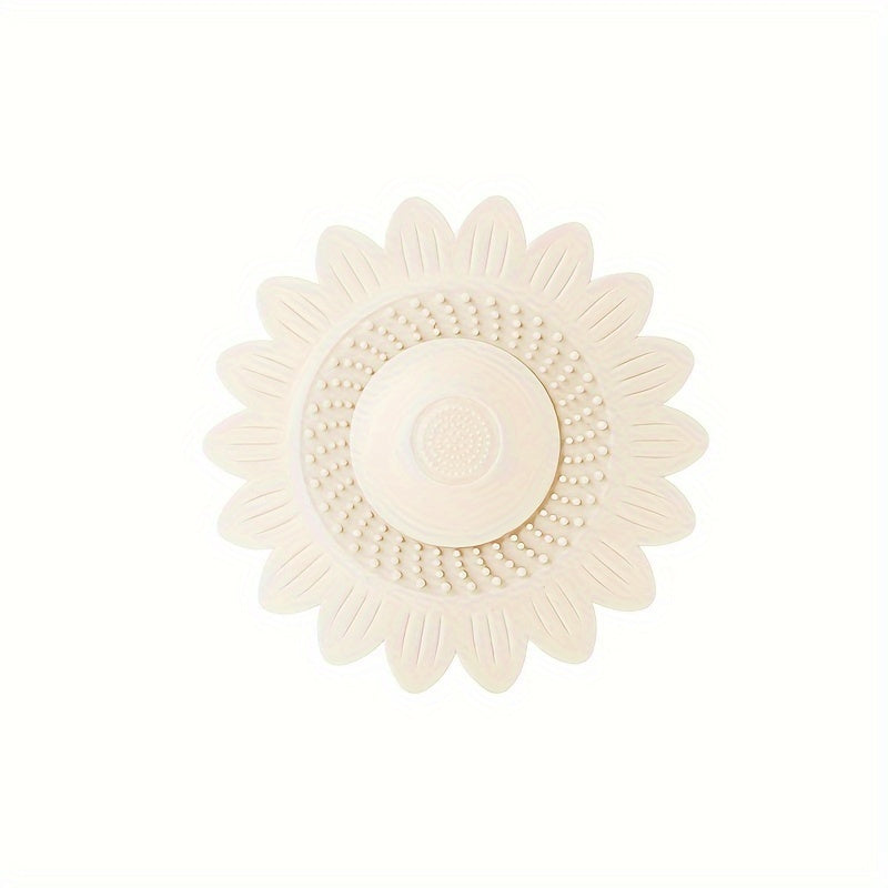 1 ta quyosh gul dizaynidagi silikon drenaj tutqichi, hammom lavabo va dush poliga mo'ljallangan.