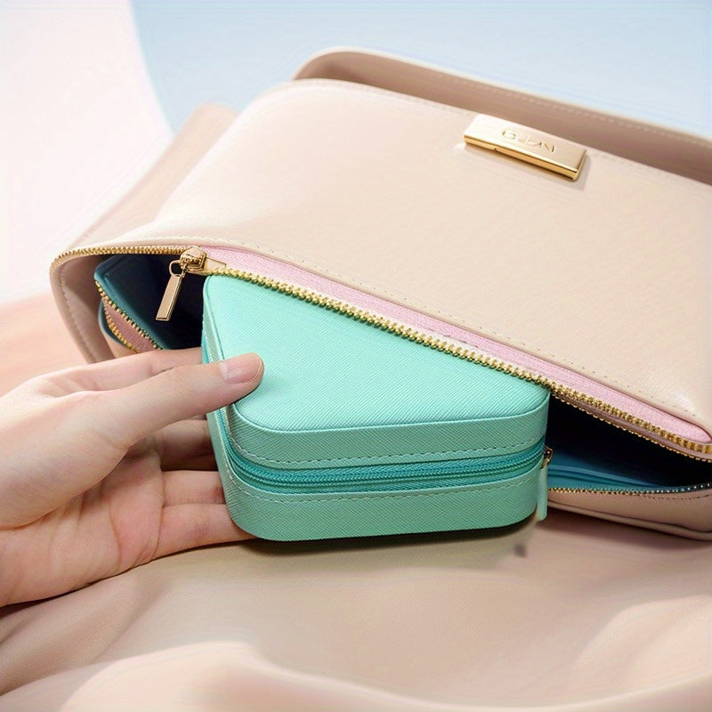 Klassik sun'iy charmdan yasalgan, uzuklar, marjonlar, bilakuzuklar va quloq bilagichlari uchun zip yopiq portativ sayohat zargarlik qutisi.