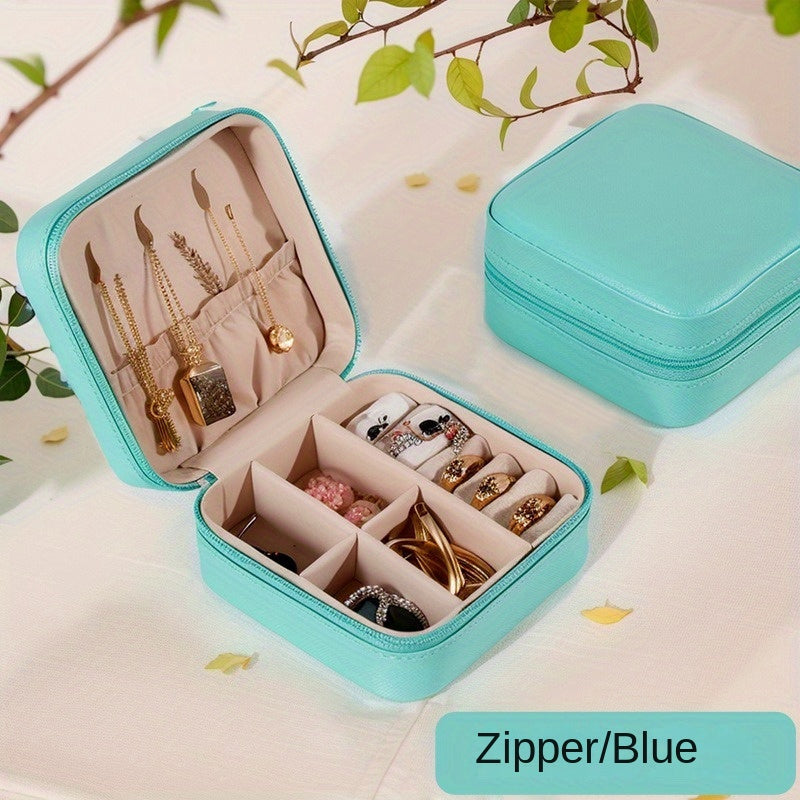 Klassik sun'iy charmdan yasalgan, uzuklar, marjonlar, bilakuzuklar va quloq bilagichlari uchun zip yopiq portativ sayohat zargarlik qutisi.