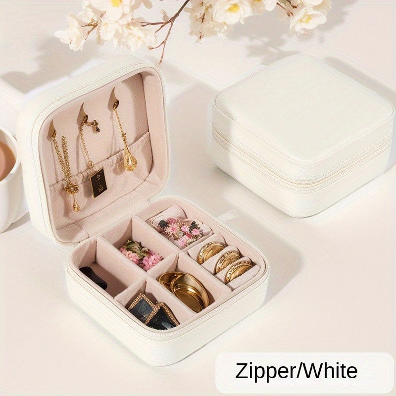 Klassik sun'iy charmdan yasalgan, uzuklar, marjonlar, bilakuzuklar va quloq bilagichlari uchun zip yopiq portativ sayohat zargarlik qutisi.