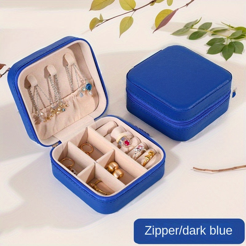 Klassik sun'iy charmdan yasalgan, uzuklar, marjonlar, bilakuzuklar va quloq bilagichlari uchun zip yopiq portativ sayohat zargarlik qutisi.