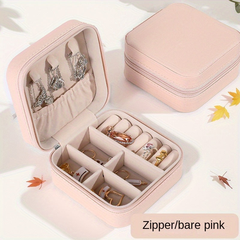 Klassik sun'iy charmdan yasalgan, uzuklar, marjonlar, bilakuzuklar va quloq bilagichlari uchun zip yopiq portativ sayohat zargarlik qutisi.