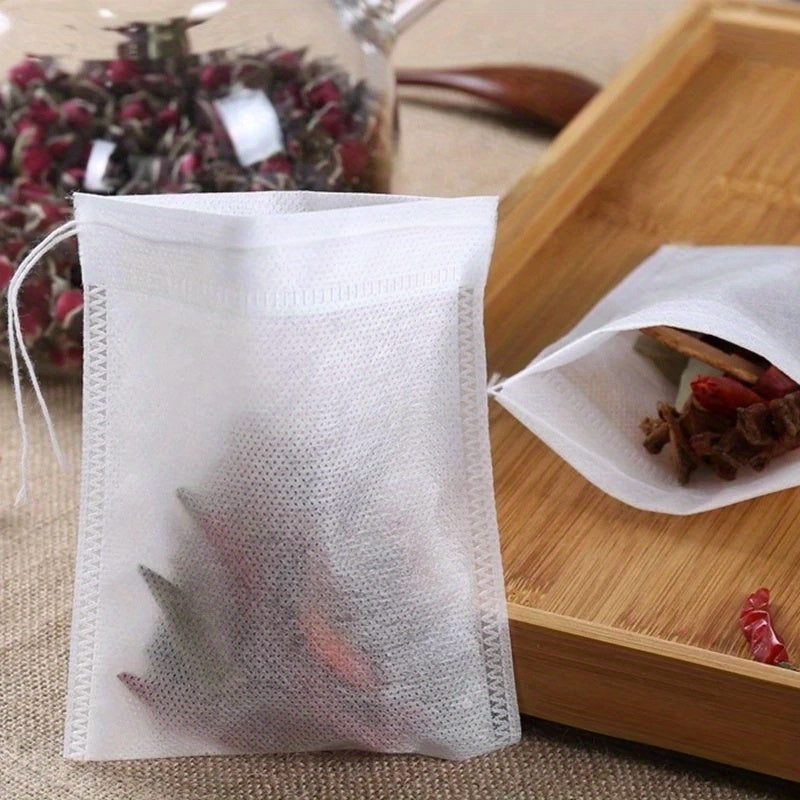 Bundle of 100 Non-Woven Tea Infusers with Drawstring for Loose Leaf Tea and Coffee