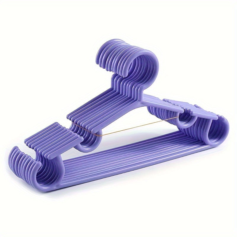 Set of 10 Pink Plastic Hangers Non-Slip Grooves for Clothes Organization and Travel