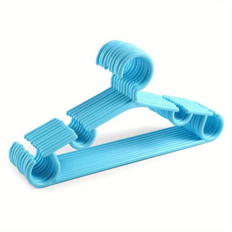 Set of 10 Pink Plastic Hangers Non-Slip Grooves for Clothes Organization and Travel