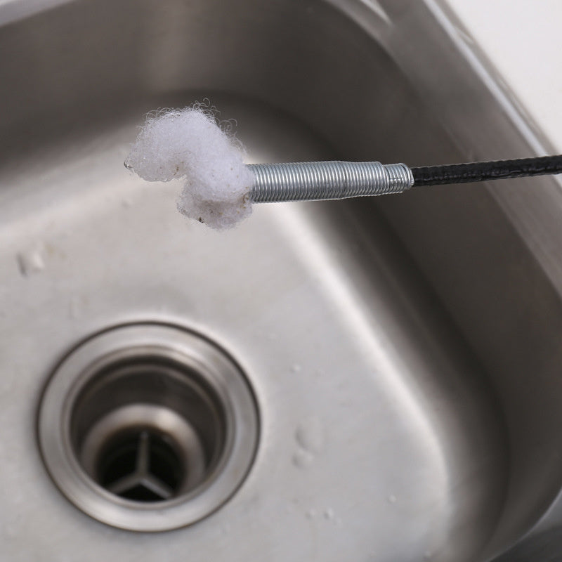 Herramienta flexible para eliminar obstrucciones en desagües de metal con mango rojo para lavabo y inodoro