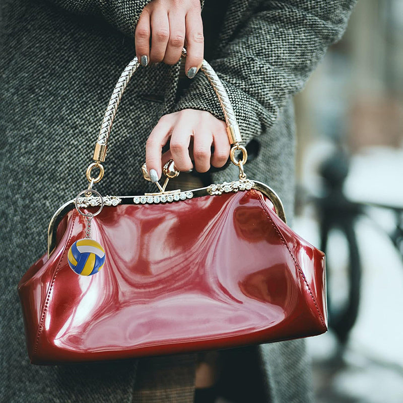 Juego de 4 llaveros de silicona de voleibol para bolsos y mochilas