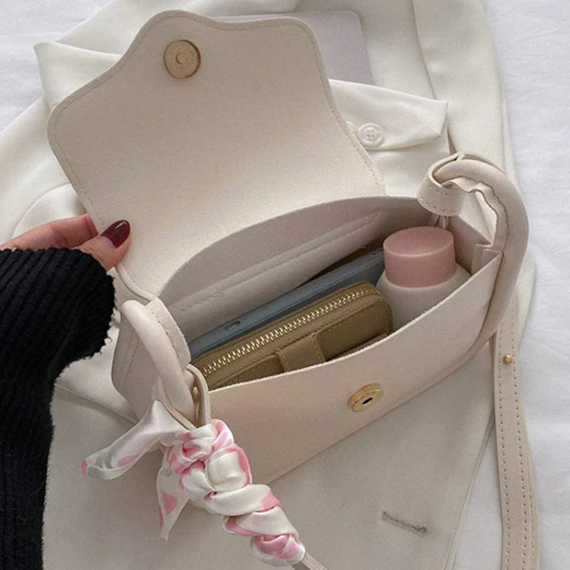 Retro Saddle Bag for Women Faux Leather Crossbody Bag with Slanted Cross Design and Multiple Colors