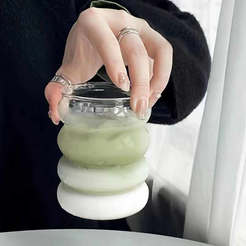 Premium borosilikat shishadan tayyorlangan izolyatsiyalangan Caterpillar kubog'i. Faqat qo'lda yuvish. Issiq va sovuq ichimliklar uchun mos. Ekologik toza va qayta ishlanadigan.