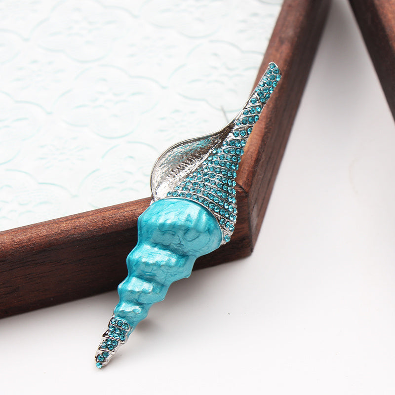 Vintage Turquoise Conch Shell Brooch with Rhinestones and Drip Oil Details