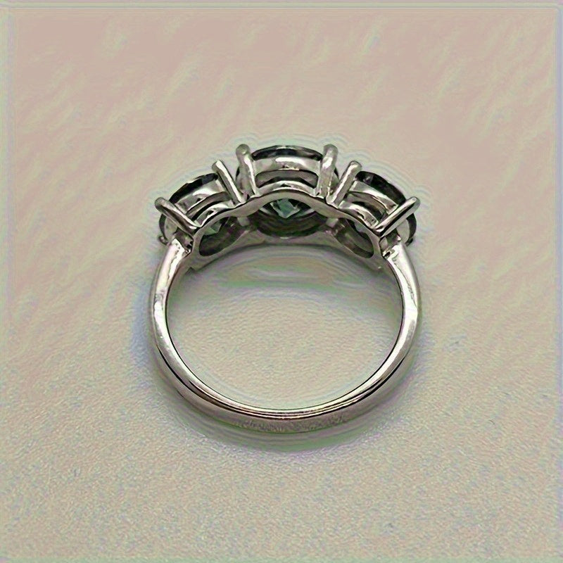 Sterling Silver Ring with 2 Carat Moissanite and Green Round-Cut Stones