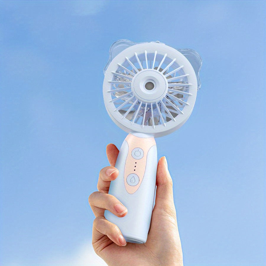 Портативный ручной вентилятор со встроенным аккумулятором, кнопками управления и возможностью зарядки через мини-USB.