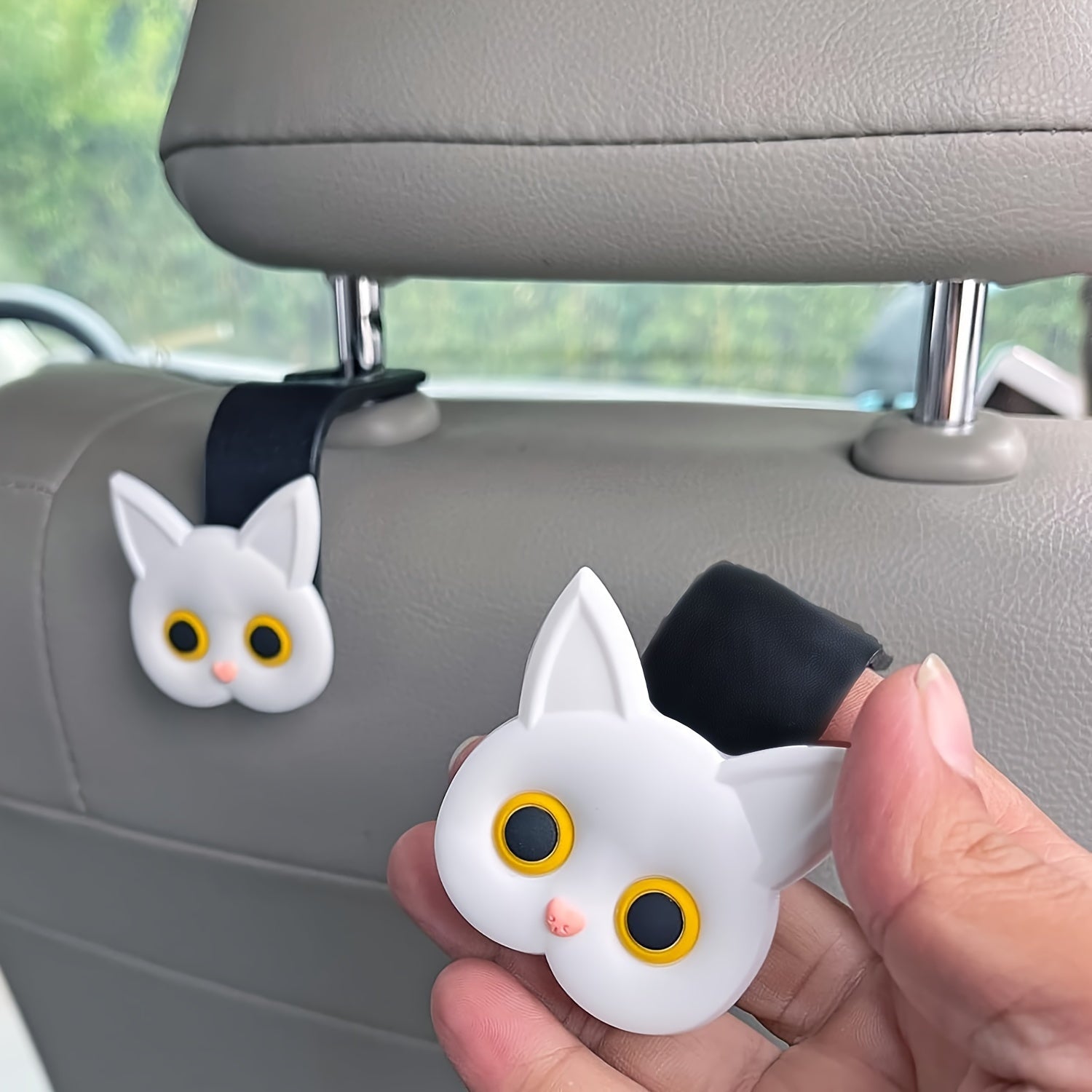 Juego de 2 ganchos de plástico con diseño de gato en 3D para reposacabezas de coche, colgadores para almacenamiento de bolsos y carteras