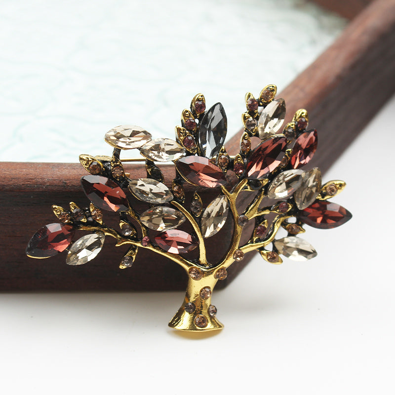 Vintage-Inspired Rhinestone Brooch with Wishing Tree Design