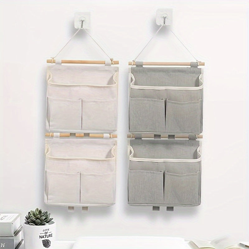Organizador de pared de lino impermeable con múltiples bolsillos para sala de estar, dormitorio y baño