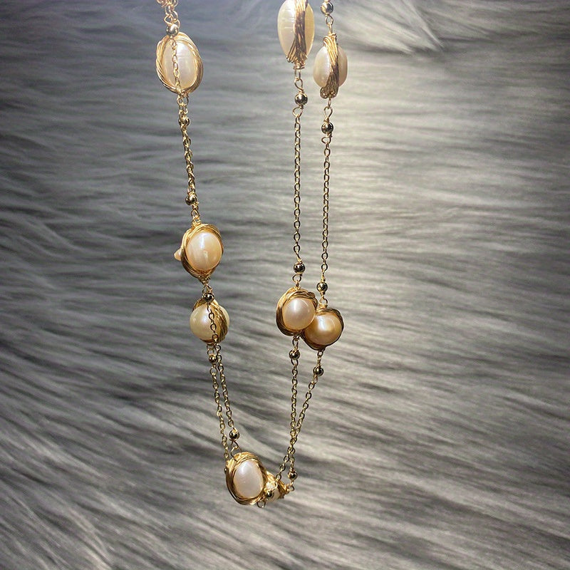 Vintage ilhomlangan Freshwater Pearl Necklace - Har qanday kiyimga nafis qo'shimcha, oddiy kiyim va maxsus tadbirlar uchun mos. Bepul sovg'a qutisi bilan birga keladi. Uchta ajoyib uslubdan tanlang: Sleeping Beauty, Starry Sky yoki Knitted Sweater.