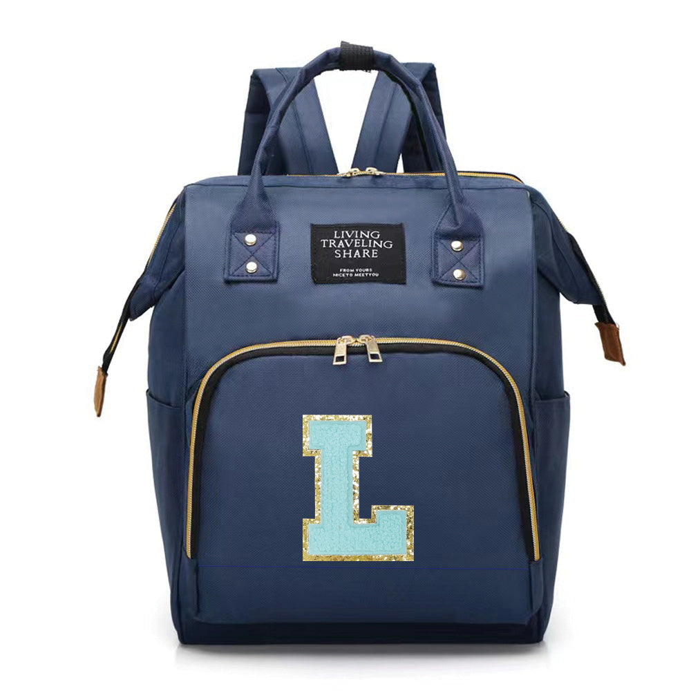 Blue Polyester Diaper Bag with Multiple Compartments and Bottle Holder