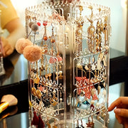 Soporte organizador de joyas con almacenamiento transparente y exhibición giratoria de 360° para pendientes, pulseras y collares