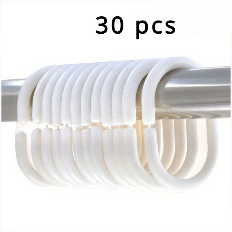 30 ta plastik dush pardasi tutqichlari, C-shaklidagi halqalar va oson harakat qilish uchun mustahkam tugmachali yopilish.