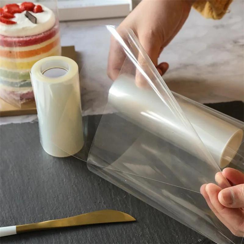 Shaffof asetat shokoladli konfet pishirish filmi bilan tayyorlangan qayta ishlatiladigan PET tort qopqog'i, qulflanishi bilan, muzlatgichda saqlash uchun mos. O'lchamlari 8 sm x 10 m yoki 10 sm x 10 m da mavjud.