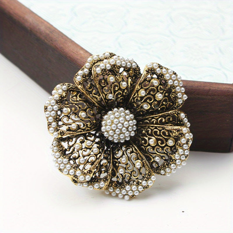 Retro Rhinestone Flower Brooch with Pearl Embellishments and Filigree Cut-Out Design